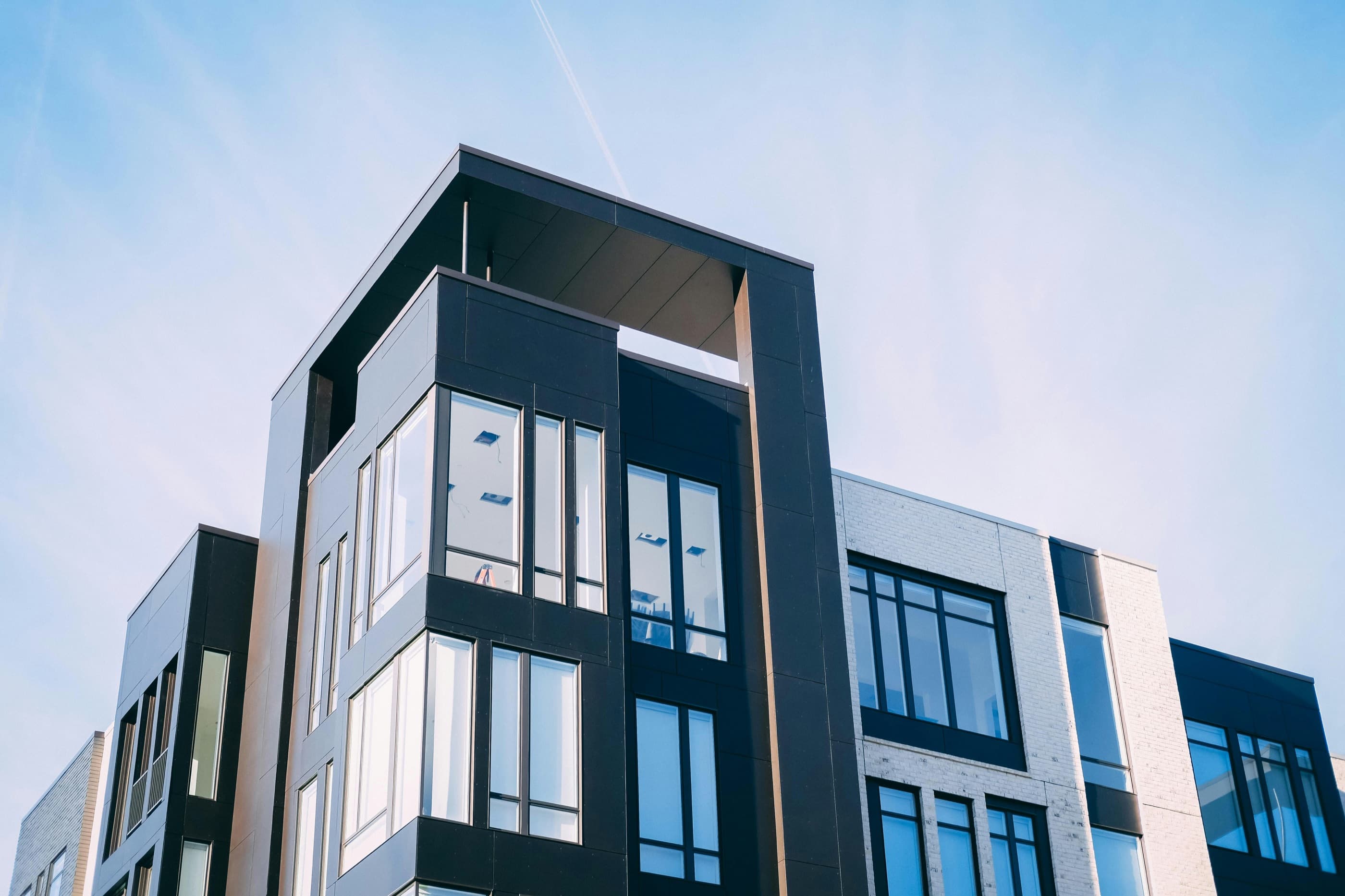 A precast residential frame against blue sky